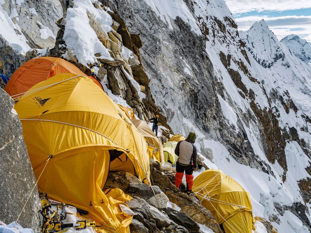 Hikers' camp in big mountain country at a high base camp